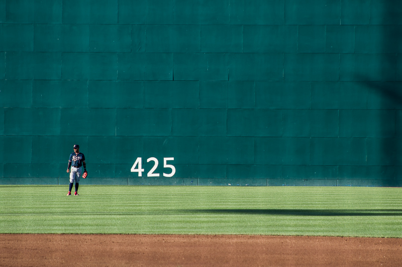 Baseball player next to the number 425
