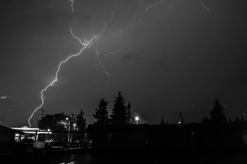 A black and white photo of lightning striking.